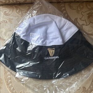 Guinness Two-Tone Bucket Hat in Black and White with Gold Harp